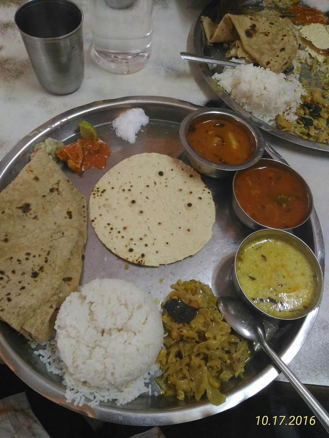 A meal laid out on a thali